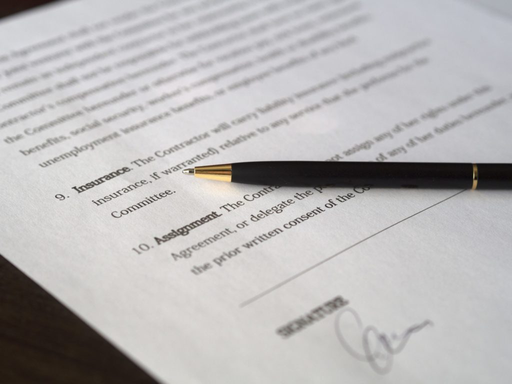 a photo of a pen on a piece of legal document