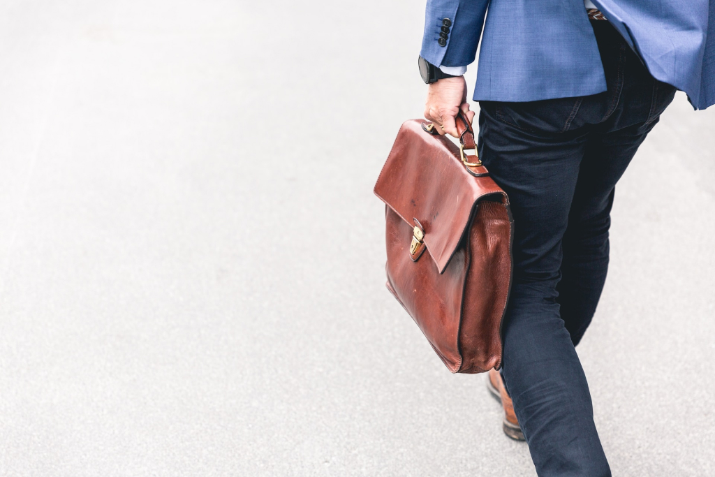 Image of a man with a brown briefcase for the california probate fees Blog Article